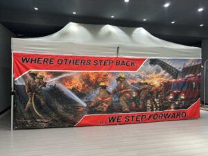 Firefighter 'Where others step back, we step forward' printed tent sidewall